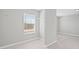 Walk-in closet featuring a window and clothing rack at 701 Cupcake Ct, Mcdonough, GA 30252