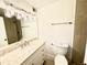 Bright bathroom with white marble counters, modern sink, stylish lighting, and tile accents at 925 Seasons Pkwy, Norcross, GA 30093