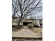 Condominium exterior with walkways and landscaping in front at 925 Seasons Pkwy, Norcross, GA 30093
