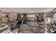 Community gym featuring modern equipment, weights, exercise machines and natural light at 925 Seasons Pkwy, Norcross, GA 30093