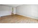 Spacious bedroom with wood floors and an ensuite bathroom at 1150 Collier Nw Rd # J11, Atlanta, GA 30318