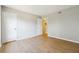 Neutral bedroom with wood flooring and white trim at 1150 Collier Nw Rd # J11, Atlanta, GA 30318
