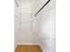 Walk-in closet featuring adjustable wire shelving and wood-look flooring at 1150 Collier Nw Rd # J11, Atlanta, GA 30318