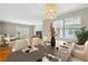 Inviting dining area with modern lighting and an open layout to the living room at 1150 Collier Nw Rd # J11, Atlanta, GA 30318