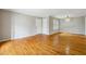 Bright and spacious living area featuring hardwood floors and neutral paint at 1150 Collier Nw Rd # J11, Atlanta, GA 30318