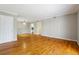 Expansive living area with hardwood floors, neutral walls, and open layout at 1150 Collier Nw Rd # J11, Atlanta, GA 30318