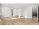 Bright bedroom featuring hardwood floors, large windows, and ample natural light at 128 Owens Mill Pl, Canton, GA 30115