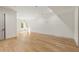 Bright bedroom with hardwood floors, recessed lighting, and sun-filled windows providing natural illumination at 128 Owens Mill Pl, Canton, GA 30115