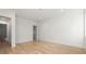 Bedroom with hardwood floors, crown molding, and bright white walls at 128 Owens Mill Pl, Canton, GA 30115