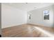 Bright bedroom with hardwood floors, recessed lighting, and large windows at 128 Owens Mill Pl, Canton, GA 30115