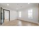 Bright living room with hardwood floors, recessed lighting, and large windows at 128 Owens Mill Pl, Canton, GA 30115
