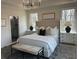 Beautiful bedroom featuring lots of natural light, a plush bed, and classic nightstands at 1919 Repose Dr, Chamblee, GA 30341