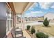 Inviting front porch with comfortable seating and well-maintained landscaping at 2248 Newbury Oaks Dr, Lawrenceville, GA 30044