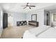 Spacious main bedroom featuring a trey ceiling, dark paneled doors, dresser, and a ceiling fan at 2248 Newbury Oaks Dr, Lawrenceville, GA 30044