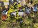Aerial view of the home among mature trees showing the pool, patio, and overall lot layout at 582 Lakeshore Ne Dr, Atlanta, GA 30307
