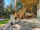 Outdoor patio with beautiful wooden steps leading to a well-manicured lawn at 582 Lakeshore Ne Dr, Atlanta, GA 30307