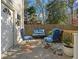 Relaxing outdoor patio with stylish seating and stone flooring at 582 Lakeshore Ne Dr, Atlanta, GA 30307