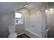 Bathroom with tub/shower and small window at 984 Cascade Sw Rd, Atlanta, GA 30311