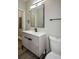 Modern bathroom with stylish vanity, large mirror, and contemporary fixtures at 984 Cascade Sw Rd, Atlanta, GA 30311