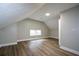 Bedroom featuring new floors, neutral paint, closet, and window at 984 Cascade Sw Rd, Atlanta, GA 30311