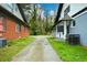 Long driveway between homes leading to backyard at 984 Cascade Sw Rd, Atlanta, GA 30311