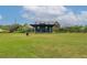Expansive community green space with an outdoor stage and gathering place, perfect for community events at 1206 Red Fox Cir, Woodstock, GA 30188