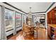 Inviting dining room with hardwood floors and natural light creating a warm and welcoming atmosphere at 1206 Red Fox Cir, Woodstock, GA 30188