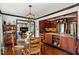 Inviting dining room with hardwood floors and natural light creating a warm and welcoming atmosphere at 1206 Red Fox Cir, Woodstock, GA 30188