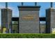 Entrance to a commercial building featuring brick architecture and clear signage that creates an inviting space at 1206 Red Fox Cir, Woodstock, GA 30188