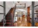 Grand foyer with staircase, wood floors, and abundant natural light at 1206 Red Fox Cir, Woodstock, GA 30188