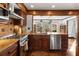 Well-equipped kitchen with stainless steel appliances and counter space, ideal for cooking and meal preparation at 1206 Red Fox Cir, Woodstock, GA 30188