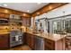Well-equipped kitchen with stainless steel appliances and counter space, ideal for cooking and meal preparation at 1206 Red Fox Cir, Woodstock, GA 30188