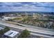 High-rise aerial view of a city with highway infrastructure at 213 The South Chace Ne, Sandy Springs, GA 30328
