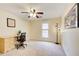 Bedroom featuring plush carpeting, ceiling fan, window, artwork, and a wooden desk with rolling chair at 213 The South Chace Ne, Sandy Springs, GA 30328