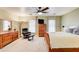 Spacious bedroom with carpet, featuring natural light, a ceiling fan, and warm, inviting decor at 213 The South Chace Ne, Sandy Springs, GA 30328