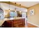 Open kitchen with granite countertops, stylish cabinetry, and stainless steel appliances at 213 The South Chace Ne, Sandy Springs, GA 30328