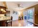 Bright kitchen featuring an island with barstool seating and access to an outdoor deck at 213 The South Chace Ne, Sandy Springs, GA 30328