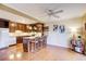 Eat-in kitchen featuring stylish cabinetry, granite counters, stainless appliances, and hardwood flooring at 213 The South Chace Ne, Sandy Springs, GA 30328