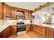 Eat-in kitchen featuring stylish cabinetry, granite counters and stainless appliances at 213 The South Chace Ne, Sandy Springs, GA 30328