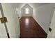 Finished attic space with hardwood floors and a window at 3070 Ridge Oak Dr, Suwanee, GA 30024