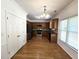Kitchen with stainless steel appliances, and wooden cabinets overlooking an eat-in breakfast area at 3070 Ridge Oak Dr, Suwanee, GA 30024