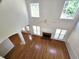 Living room featuring hardwood floors, a fireplace, and many windows at 3070 Ridge Oak Dr, Suwanee, GA 30024