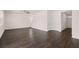 Spacious living room featuring hardwood flooring, neutral paint, and a ceiling fan at 169 Aster Avenue, Locust Grove, GA 30248