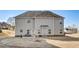 Exterior of the home from the backyard with a door and several windows at 104 Camilla Dr, Carrollton, GA 30116