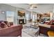 Inviting living room with fireplace, recessed lighting, and open layout to the kitchen at 104 Camilla Dr, Carrollton, GA 30116