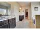 Beautiful bathroom with double sinks, tile floor and a separate tub and shower area at 104 Camilla Dr, Carrollton, GA 30116