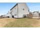 Expansive backyard featuring a fenced yard, grassy area, and landscape, providing privacy and room to play at 224 Shoals Bridge Rd, Acworth, GA 30102