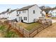 Wide backyard featuring a fenced yard, grassy area, and landscape, providing privacy and room to play at 224 Shoals Bridge Rd, Acworth, GA 30102