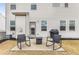 Cozy backyard patio with patio seating and a grill, perfect for outdoor dining and relaxation at 224 Shoals Bridge Rd, Acworth, GA 30102