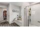 Bathroom with a separate glass shower, soaking tub, and access to a walk-in closet at 224 Shoals Bridge Rd, Acworth, GA 30102
